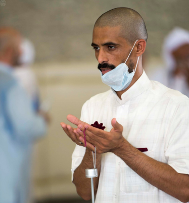 A man performing the Hajj prays. Photo via SPA.