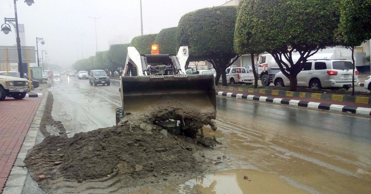 Saudi authorities begin to clean up after rains cause flooding.
