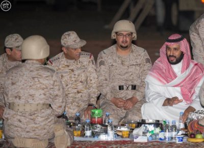 Crown Prince and Minister of Defense Mohammed bin Salman dines with Saudi security forces.